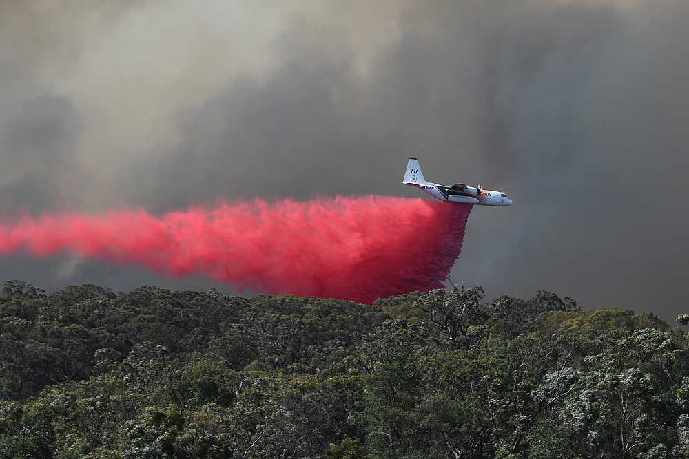 An air tanker drops fire retardant on the Gospers Mountain fire near Colo Heights, northwest of Sydney, Australia November 15, 2019. u00e2u20acu201d AAP Image/Dean Lewins via Reuters