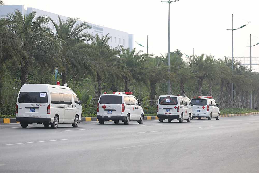 Ambulances from Ha Tinh province are seen while allegedly carrying some of the bodies of victims on 39 deaths on a truck container in UK, leave Noi Bai airport in Hanoi, Vietnam November 27, 2019. u00e2u20acu201d Reuters pic