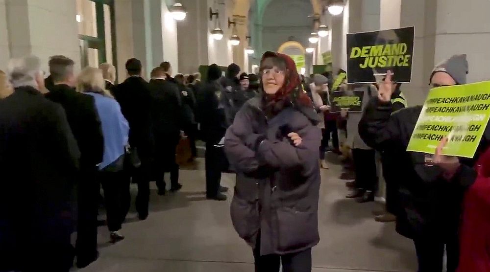 Demonstrators protest outside the venue where US Supreme Court Justice Brett Kavanaugh addressed the Federalist Society at Washington's Union Station November 14, 2019. u00e2u20acu201d Still video image/Kevin Althaus via Reuters