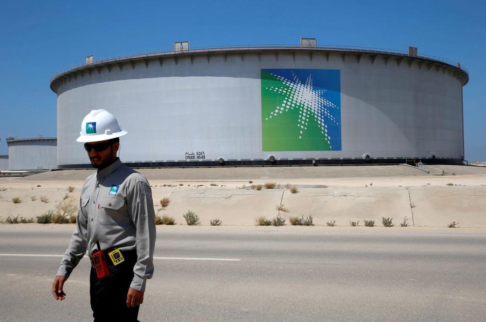 An Aramco employee walks near an oil tank at Saudi Aramcou00e2u20acu2122s Ras Tanura oil refinery and oil terminal in Saudi Arabia May 21, 2018. u00e2u20acu201d Reuters pic