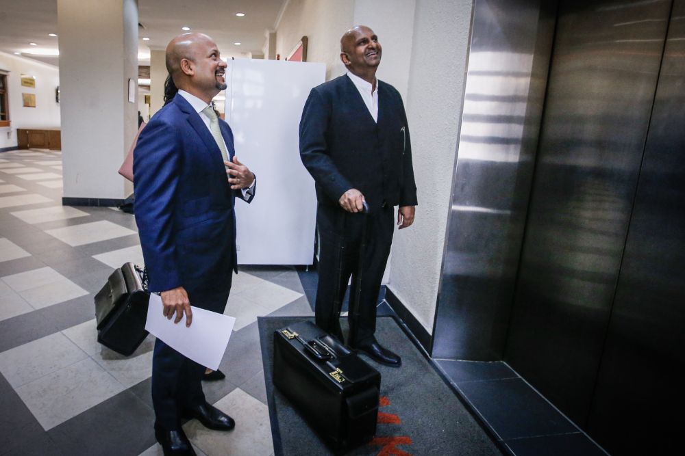 Ex-1MDB CEO Arul Kanda Kandasamy (left) is pictured with his lawyer Datuk N. Sivananthan at the Kuala Lumpur Court Complex November 15, 2019. — Picture by Hari Anggara