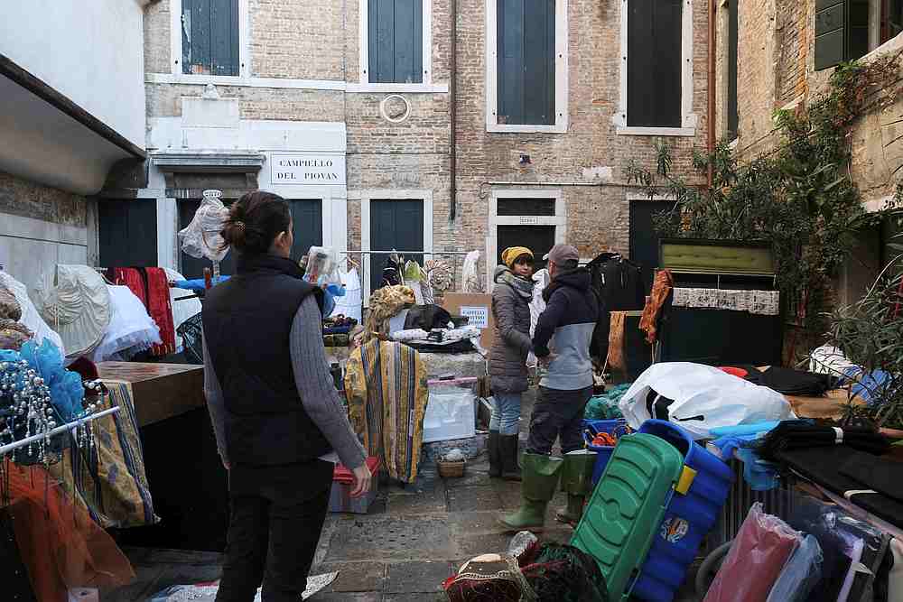 Workers of an atelier with periodical costumes and masks take protective measures after exceptionally high water levels in Venice, Italy November 14, 2019. u00e2u20acu201d Reuters pic