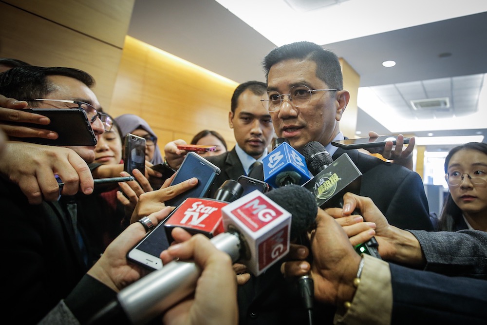 Economic Affairs Minister, Datuk Seri Azmin Ali, speaks to reporters in the lobby of Parliament November 19, 2019. u00e2u20acu201d Picture by Hari Anggara