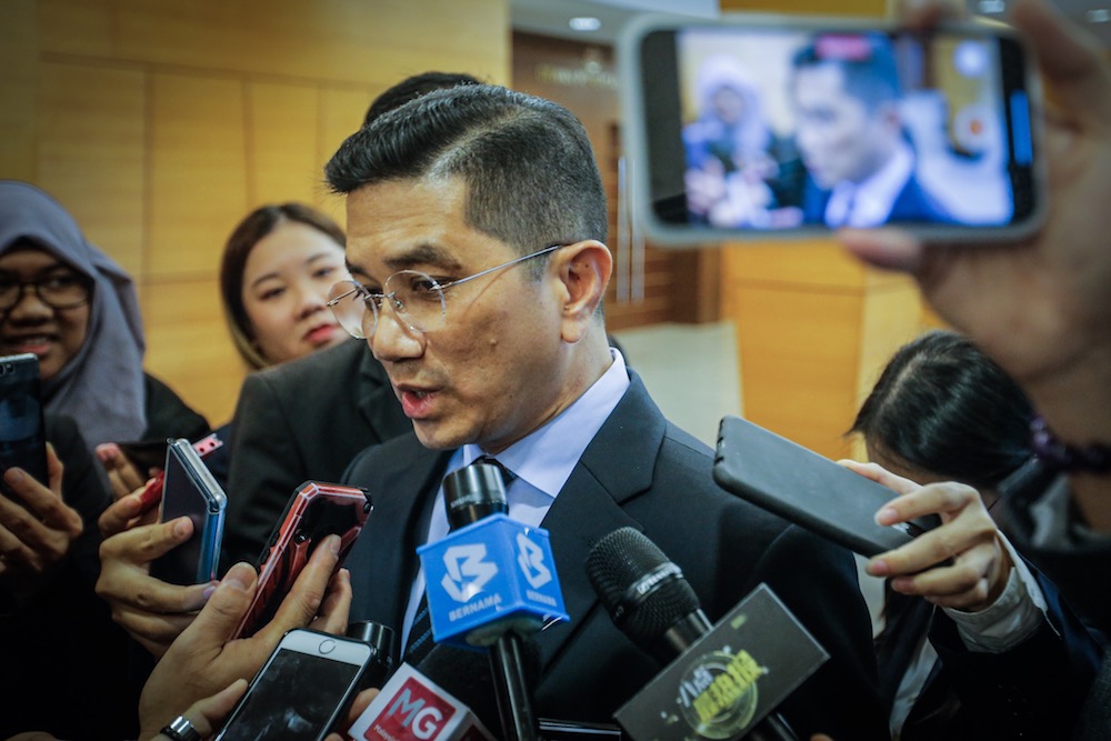 Economic Affairs Minister, Datuk Seri Azmin Ali, speaks to reporters in the lobby of Parliament November 19, 2019. u00e2u20acu201d Picture by Hari Anggara