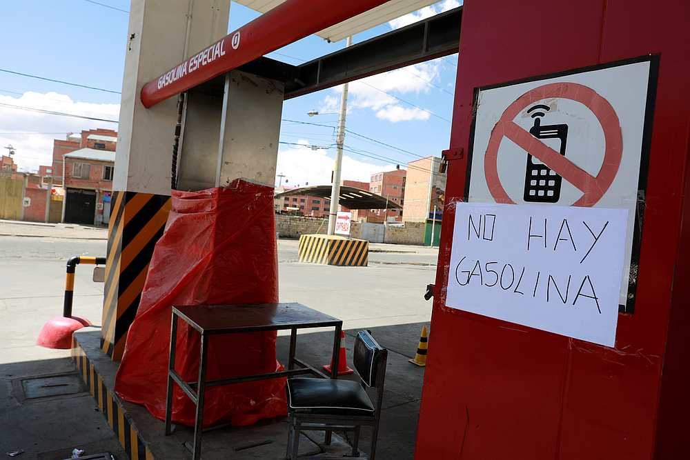 A placard is seen at a closed gas station in El Alto, near La Paz, Bolivia November 17, 2019. The placard reads, 'No gasoline.' u00e2u20acu201d Reuters pic