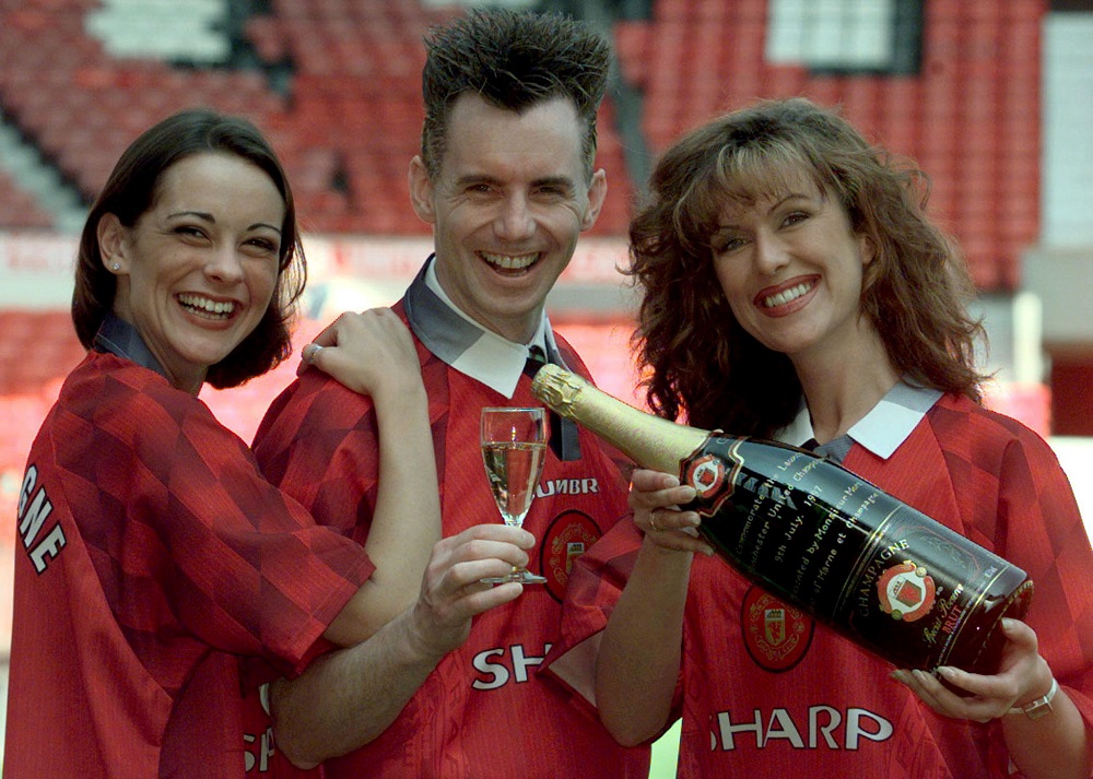TV Chef Gary Rhodes (centre) launches Manchester Unitedu00e2u20acu2122s own label champagne with models Emma Hartley (left) and Gaynor Smith at Old Trafford, Britain July 9, 1997. u00e2u20acu2022 Reuters pic