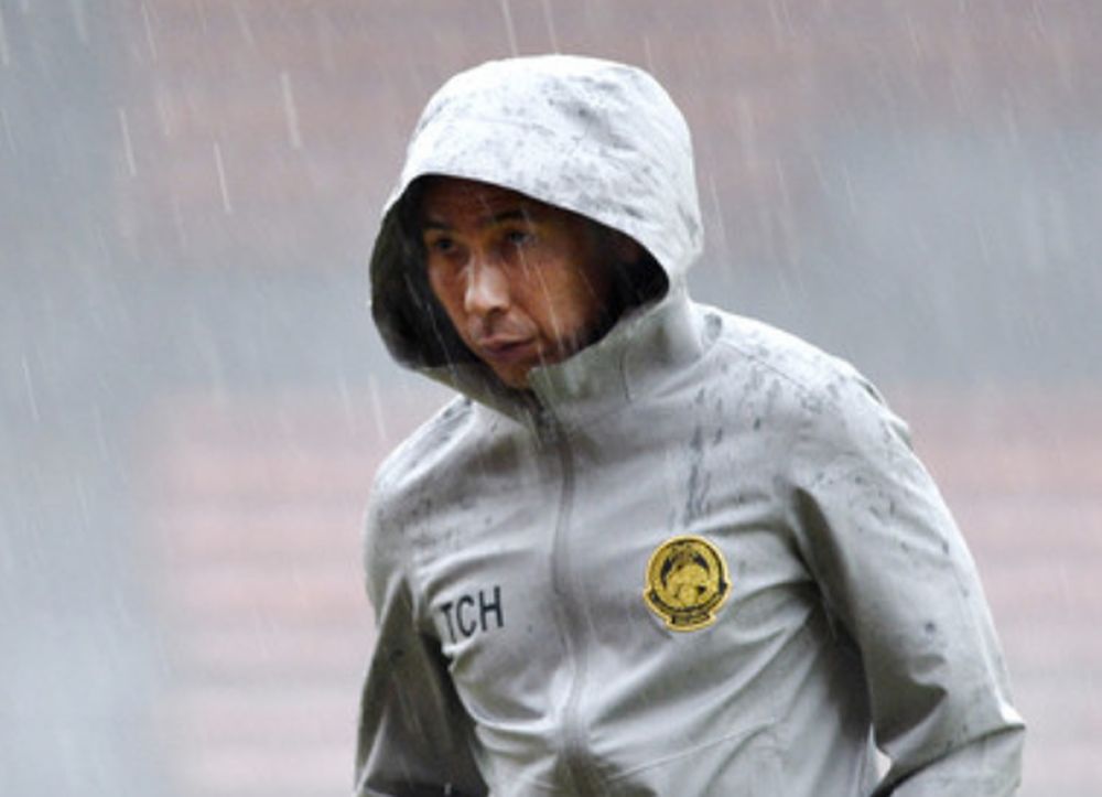 National coach Tan Cheng Hoe walks out of the field after a suspended training session following heavy rain as he prepares for Malaysia against Indonesia in the 2022 World Cup/Asia Cup 2023 qualifying at the Cheras Stadium Nov 16, 2019. u00e2u20acu201d Bernama pic