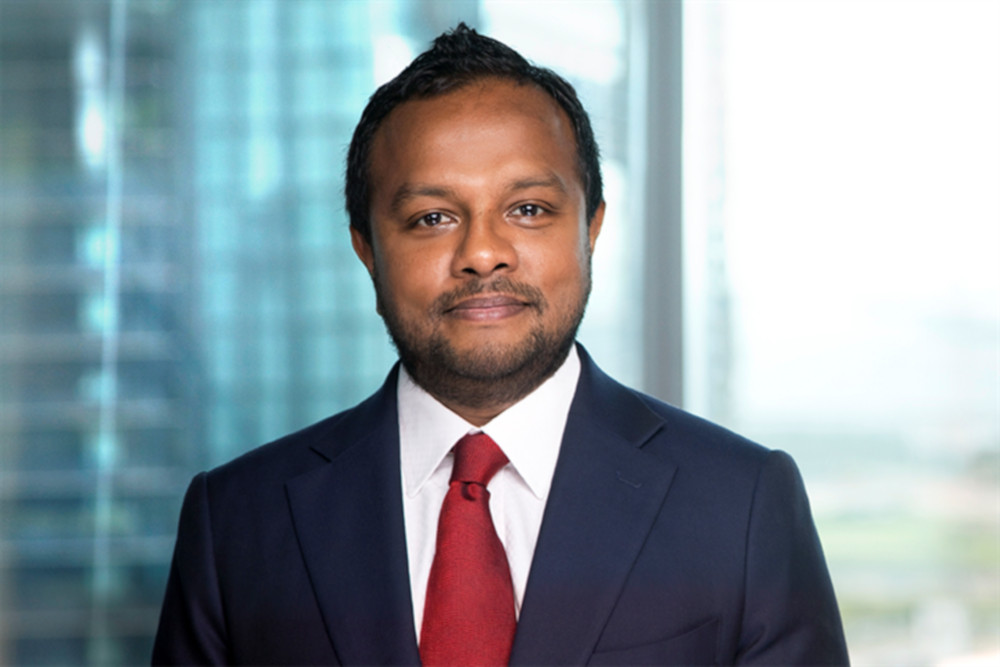 Devandran Karunakaran, 40, the former managing partner of law firm Ince Singapore, pleaded guilty to three molestation charges and causing distress to the bar manager. u00e2u20acu201d Picture from Ince website via TODAY 