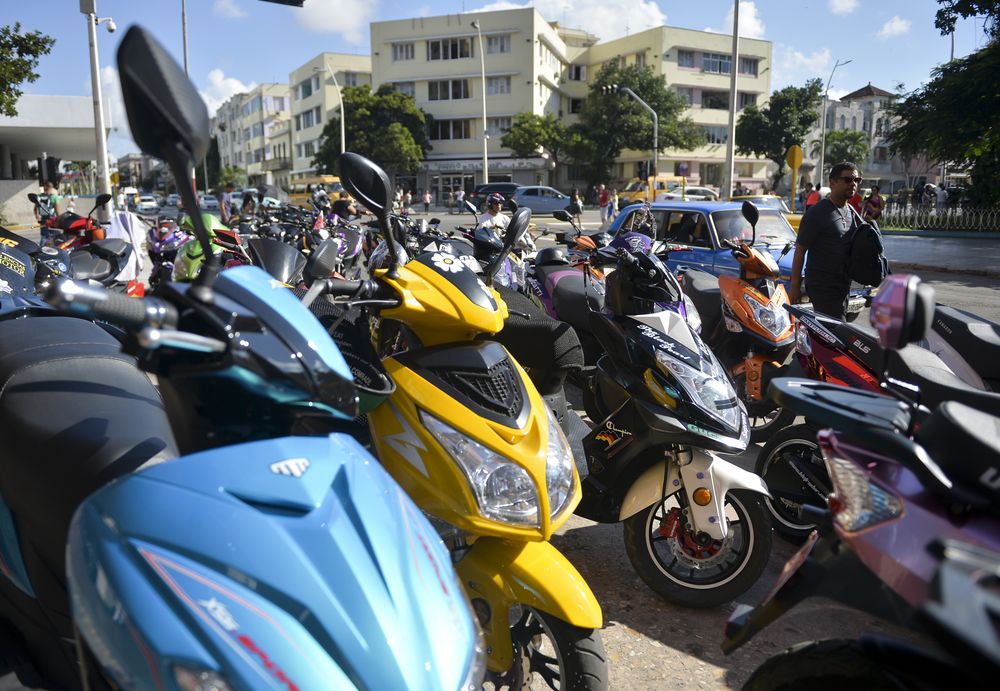 View of u00e2u20acu02dcmotorinasu00e2u20acu2122 u00e2u20acu201c electric motorcycles u00e2u20acu201c in a street of Havana. u00e2u20acu201d AFP pic