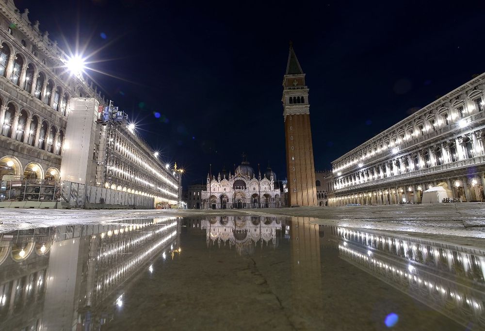 A general view shows the flooded St. Marku00e2u20acu2122s Square, with St. Marku00e2u20acu2122s Basilica (Rear left) and the Bell Tower on November 16, 2019 in Venice, two days after the city suffered its highest tide in 50 years. u00e2u20acu201d AFP pic