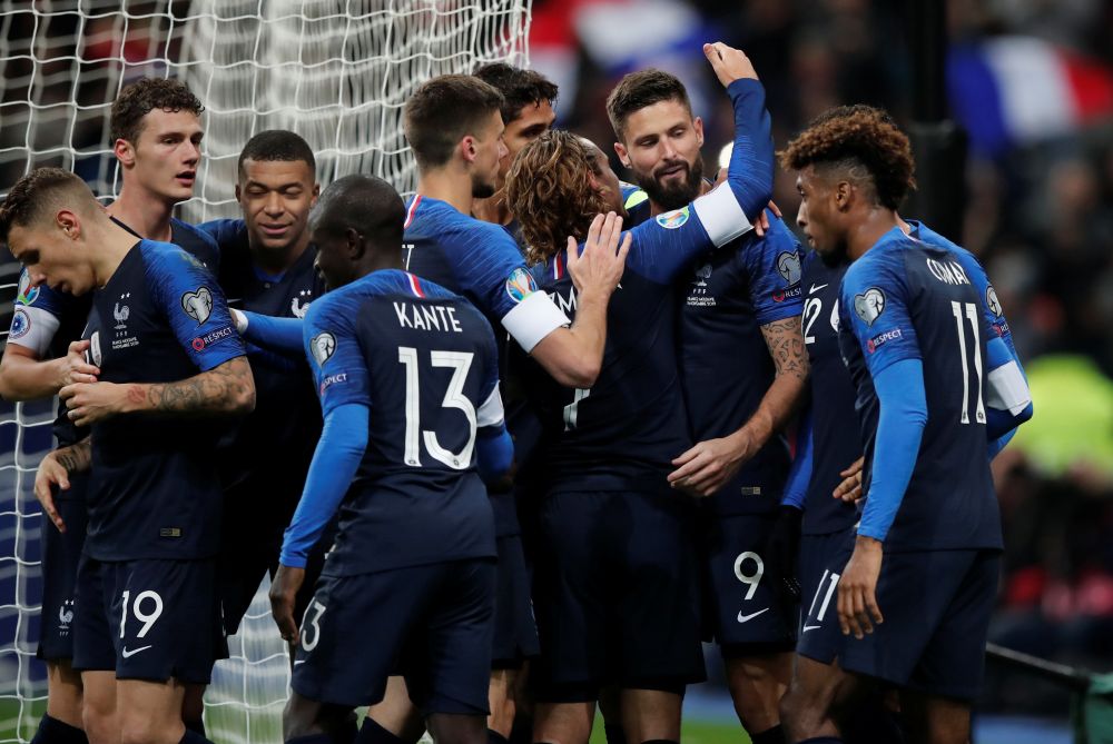 France's Olivier Giroud (9) celebrates scoring their second goal with Antoine Griezmann and teammates. u00e2u20acu201d Reuters pic
