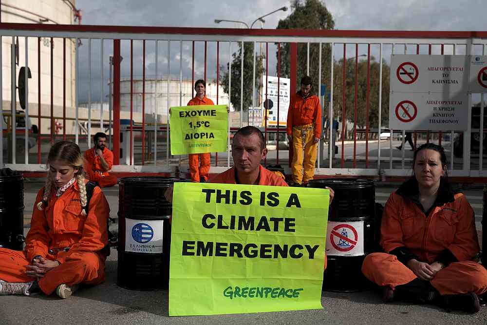 Greenpeace activists block the entrance of the Hellenic Petroleum refineries in Aspropyrgos near Athens, Greece November 21, 2019. u00e2u20acu201d Reuters pic