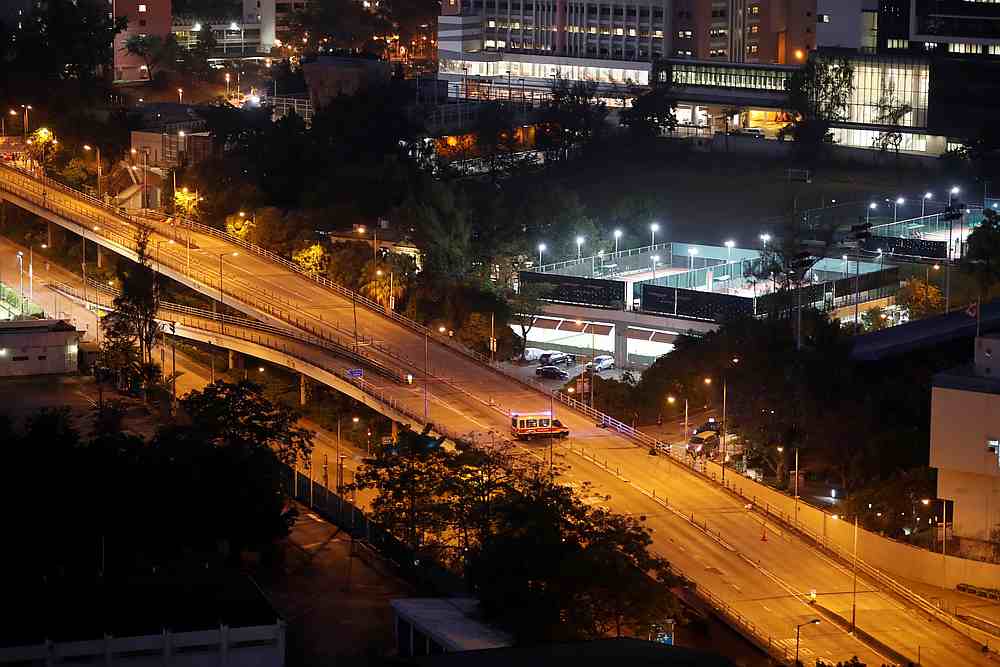A police van is seen in the middle of the highway at the Hong Kong Polytechnic University (PolyU) in Hong Kong November 20, 2019. u00e2u20acu201d Reuters pic