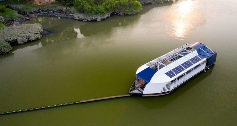 An Interceptor unit is currently cleaning up the Klang River. u00e2u20acu201d Picture via SoyaCincau