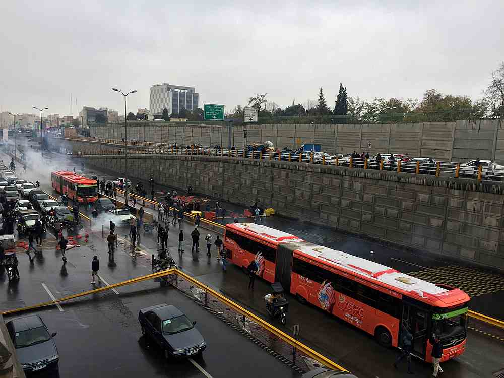 People protest against increased gas price, on a highway in Tehran, Iran November 16, 2019. u00e2u20acu201d Nazanin Tabatabaee/Wana (West Asia News Agency) pic via Reuters