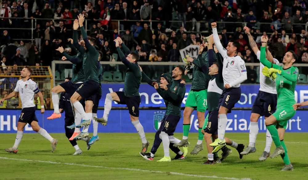 Italy players celebrate after the match at Stadio Renzo Barbera in Palermo November 19, 2019. u00e2u20acu2022 Reuters pic