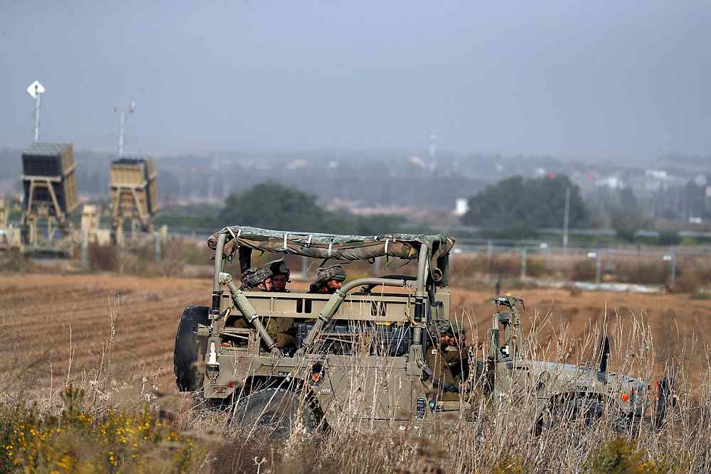 Israeli soldiers ride a military jeep in an area near the Gaza border, in southern Israel November 13, 2019. u00e2u20acu201d Reuters pic