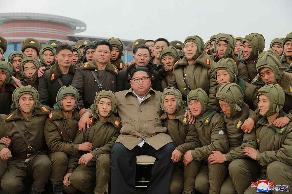 North Korean leader Kim Jong-un with sharpshooters of the Air and Anti-Aircraft Force in North Korea in this undated picture released November 17, 2019. u00e2u20acu201d KCNA pic via Reuters