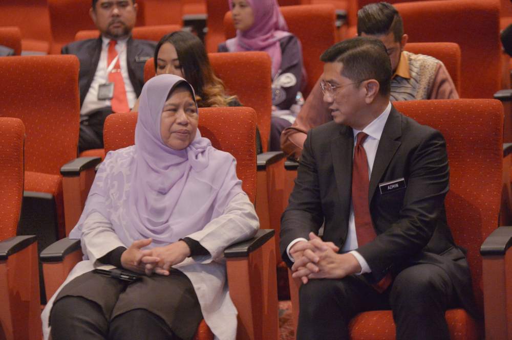 Housing and Local Government Minister Zuraida Kamaruddin (left) and Economic Affairs Minister Datuk Seri Azmin Ali attend the soft launch of Kuala Lumpur Summit in Putrajaya November 21, 2019. u00e2u20acu2022 Picture by Shafwan Zaidon