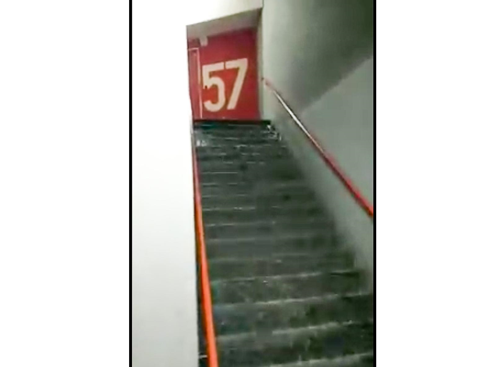 A screenshot from a viral video shows the staircase at Level 57 in Komtar which was flooded, November 22, 2019. ― Screenshot via Facebook