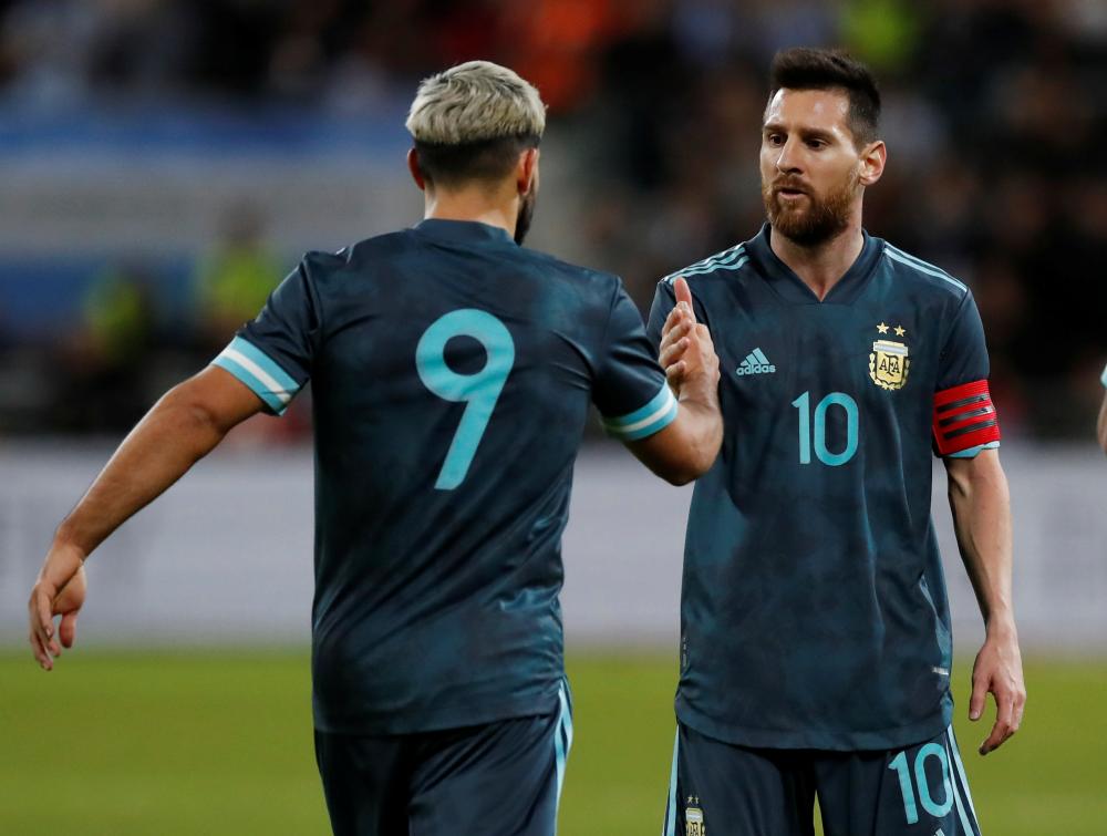 Argentina's Sergio Aguero celebrates after scoring the first goal with teammate Lionel Messi, November 18, 2019. u00e2u20acu2022 Reuters pic