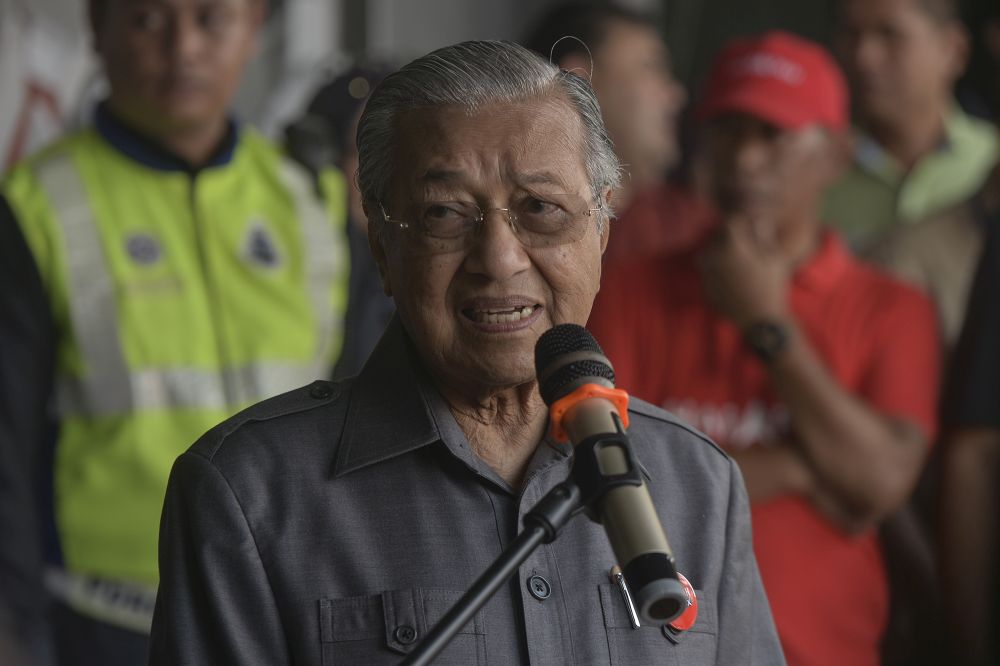 Pakatan Harapan chairman Dr Mahathir Mohamad delivers a speech while campaigning in Pekan Nanas, Pontian November 14, 2019. u00e2u20acu201d Picture by Shafwan Zaidon