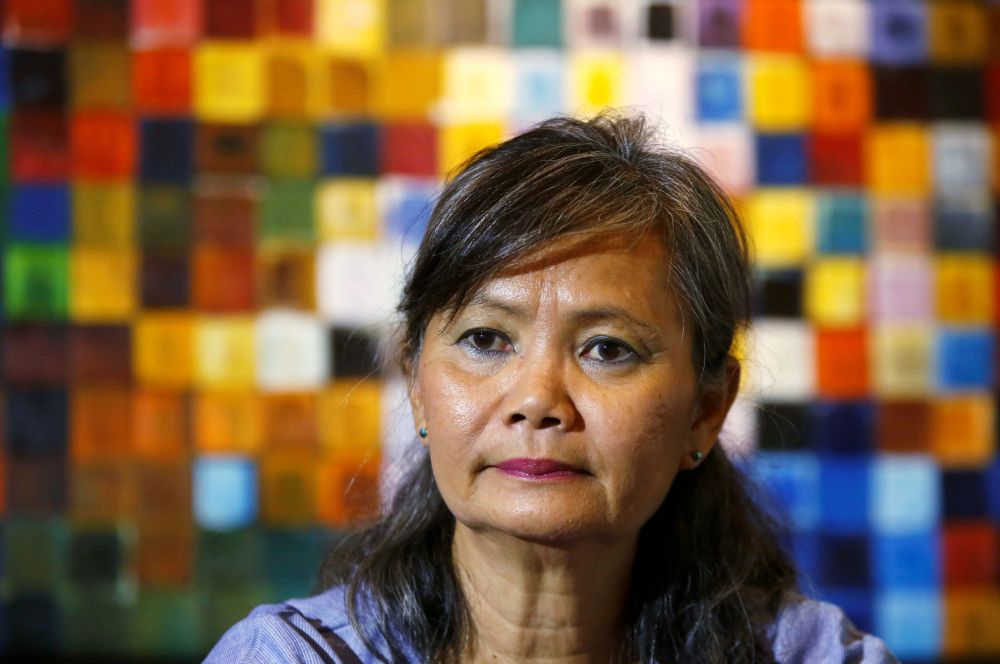 Cambodia has revoked passports for 12 CNRP officials including CNRP vice-president Mu Sochua (pic) due to their alleged fleeing of law enforcement abroad. — Reuters pic