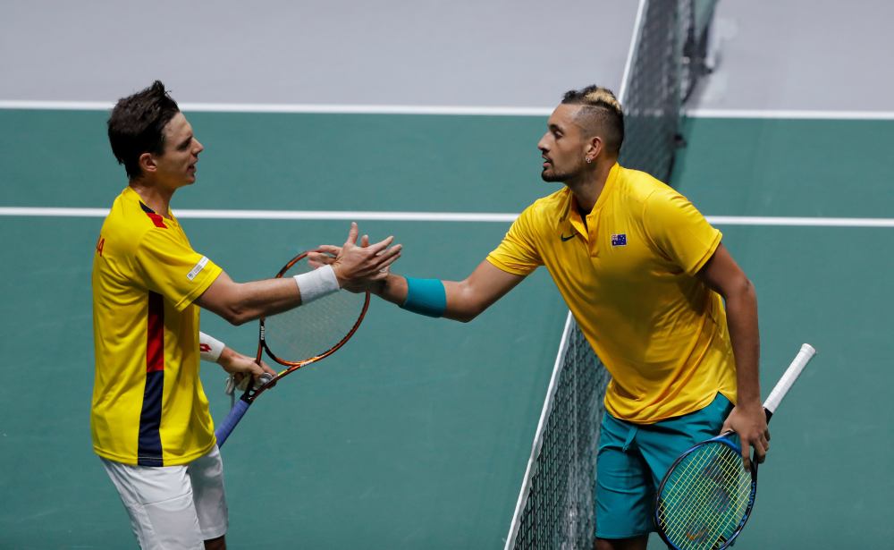 Australia's Nick Kyrgios shakes hands with Colombia's Alejandro Gonzalez after their group stage match in Madrid November 19, 2019. u00e2u20acu2022 Reuters pic