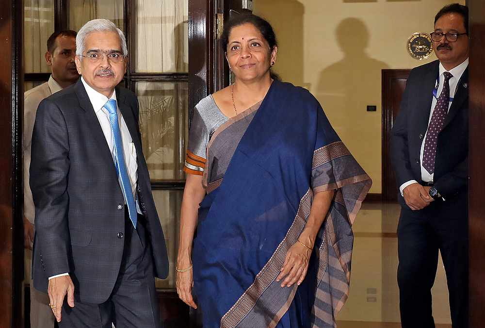 India's Finance Minister Nirmala Sitharaman (centre) and the Reserve Bank of India Governor Shaktikanta Das (left) arrive for a RBI's central board meeting in New Delhi July 8, 2019. u00e2u20acu201d Reuters pic