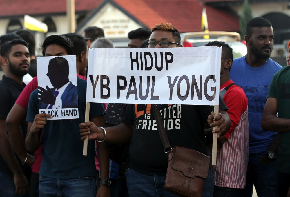 Supporters of DAP assemblyman Paul Yong gather outside the Ipoh Sessions Court November 11, 2019. — Picture by Farhan Najib