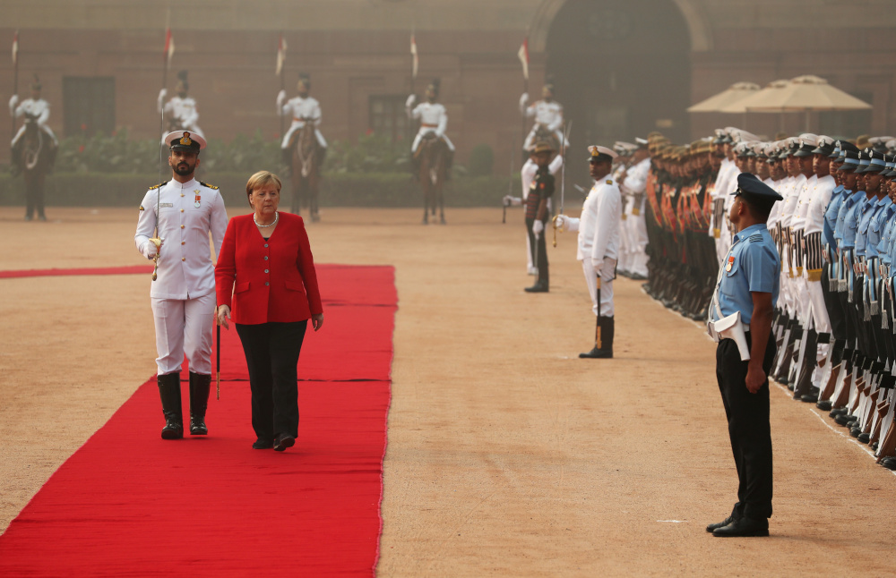German Chancellor Angela Merkel inspects an honour guard during her ceremonial reception at the forecourt of Indiau00e2u20acu2122s Rashtrapati Bhavan presidential palace in New Delhi November 1, 2019. u00e2u20acu201d Reuters pic