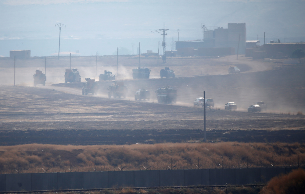 Turkish and Russian military vehicles are seen during a joint patrol in northeast Syria, as they are pictured near the Turkish border town of Kiziltepe in Mardin province November 1, 2019. u00e2u20acu201d Reuters pic
