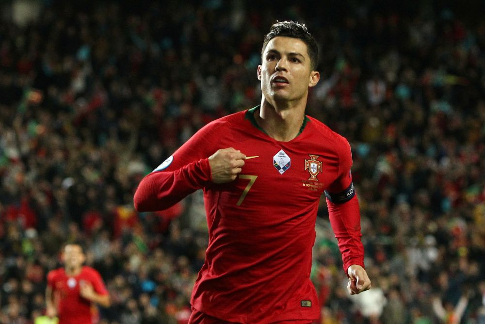 Portugal's Cristiano Ronaldo celebrates scoring their second goal against Lithuania. u00e2u20acu201d Reuters pic