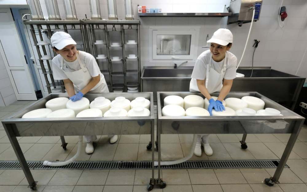u00e2u20acu02dcCheese & Beeru00e2u20acu2122 creamery co-owner Elvira Kovtun (right) and her assistant Liza produce cheeses at their creamery in the industrial town of Korolyov on November 7, 2019. u00e2u20acu2022 AFP pic