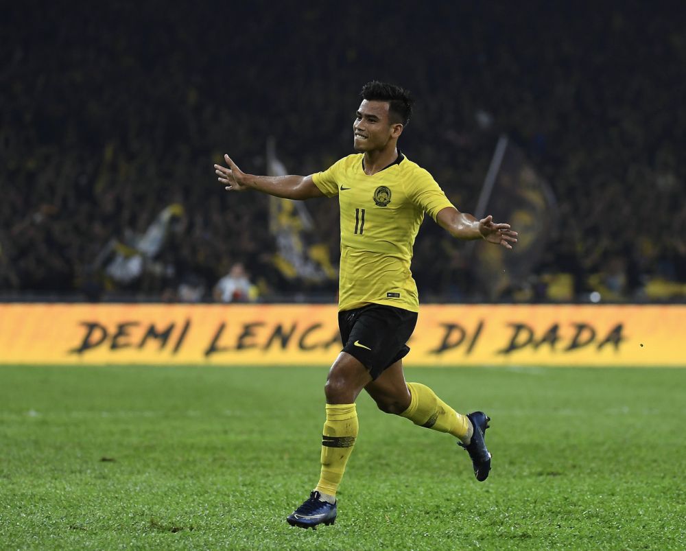 Muhammad Safawi Rasid meraikan jaringan gol bagi pasukan Malaysia pada perlawanan kelayakan Piala Dunia 2022/Piala Asia 2023 ketika menentang Indonesia di Stadium Nasional Bukit Jalil malam ini. u00e2u20acu201d Foto Bernama 