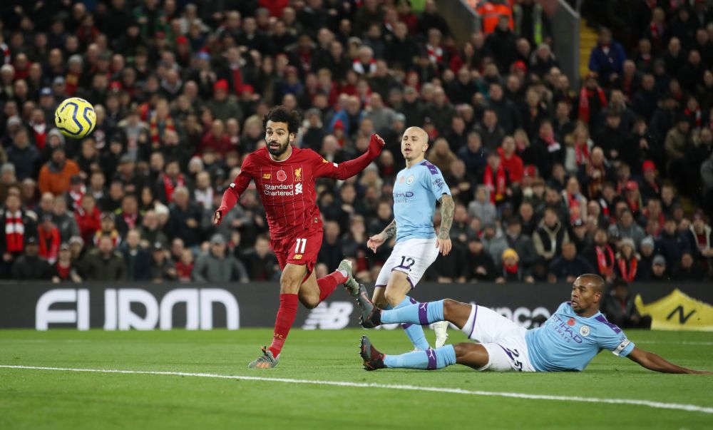 Liverpool's Mohamed Salah scores their second goal against Manchester City. u00e2u20acu201d Reuters pic