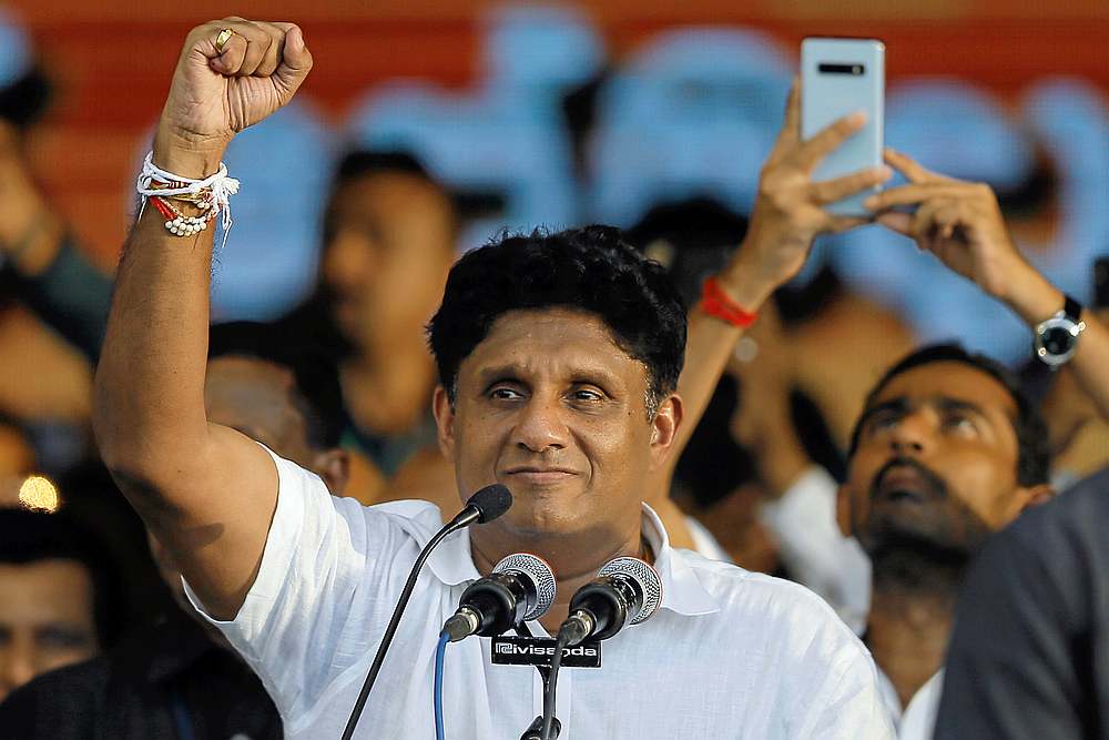 Sajith Premadasa, Sri Lanka's Housing Minister and the presidential candidate of the United National Party (UNP)-led New Democratic Front, with supporters during a election rally, in Colombo October 10, 2019.