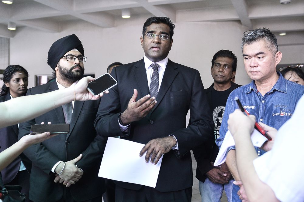 Lawyer Rajesh Nagarajan addresses reporters at the Shah Alam High Court November 7, 2019. u00e2u20acu201d Picture by Miera Zulyana