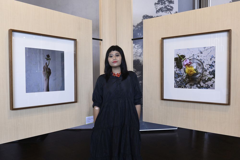 Cigarette buds are replaced with ethereal flowers in Nadirah’s photographs. — Picture by Miera Zulyana