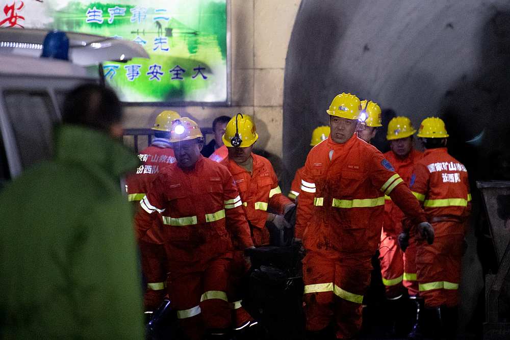 Firefighters conduct rescue work at the site following a gas explosion at a coal mine in Pingyao county, Shanxi province, China November 19, 2019. u00e2u20acu201d Wei Liang/CNS pic via Reuters