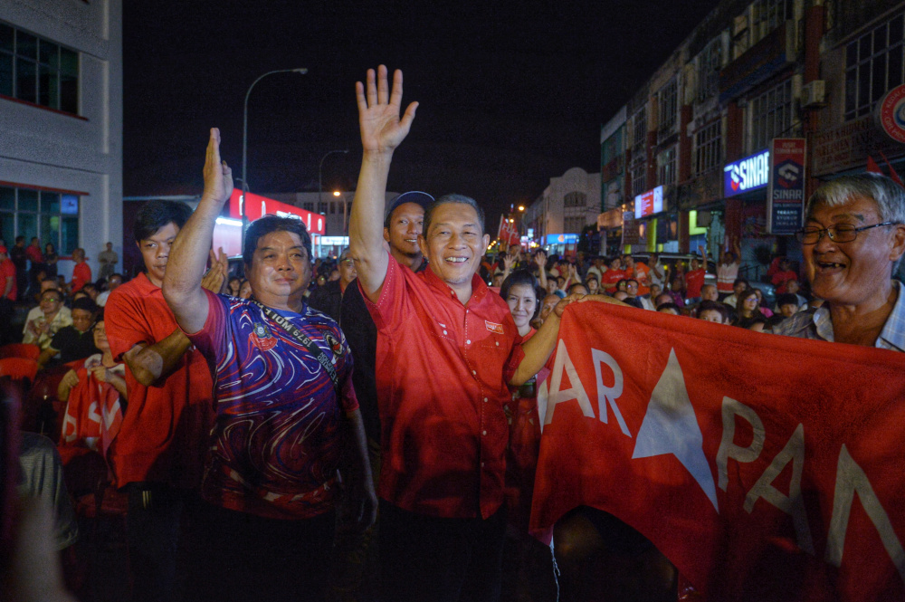 Pakatan Harapan candidate for the Tanjung Piai by-election Karmaine Sardini campaigning at Pontian industrial park November 15, 2019. u00e2u20acu201d Picture by Shafwan Zaidon