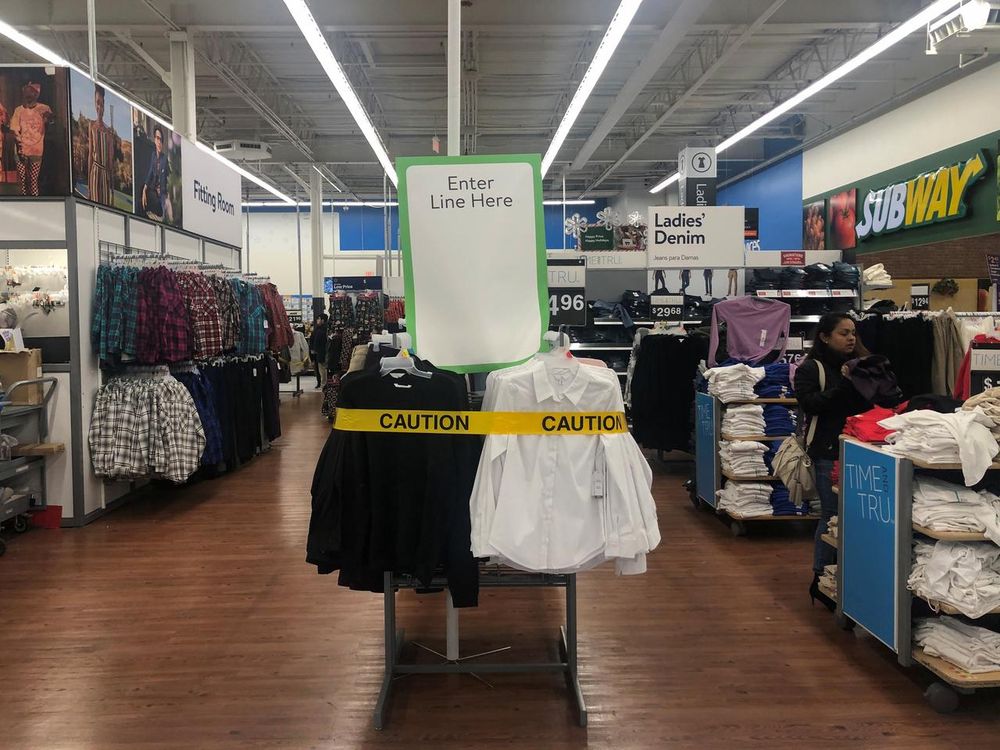 A caution tape is seen by the entrance to a line during a sales event on Thanksgiving day at Walmart in Westbury, New York, US, November 28, 2019. u00e2u20acu201d Reuters pic