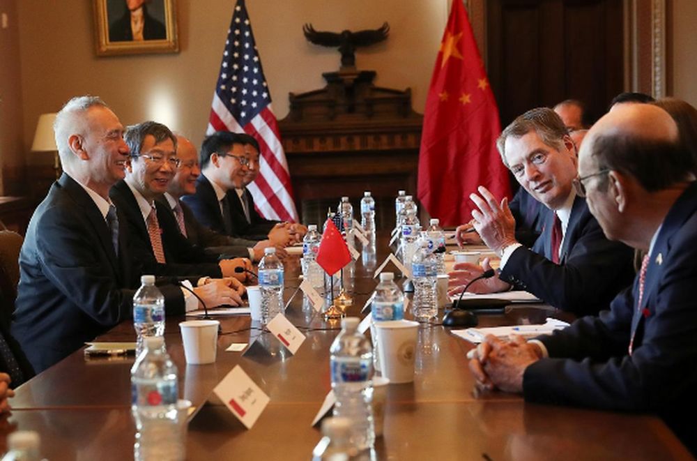 File picture shows US Trade Representative Robert Lighthizer (second right) speaking across from Chinau00e2u20acu2122s Vice Premier Lie He (left) during the opening of US-China Trade Talks at the White House in Washington, January 30, 2019. u00e2u20acu201d Reuters pic
