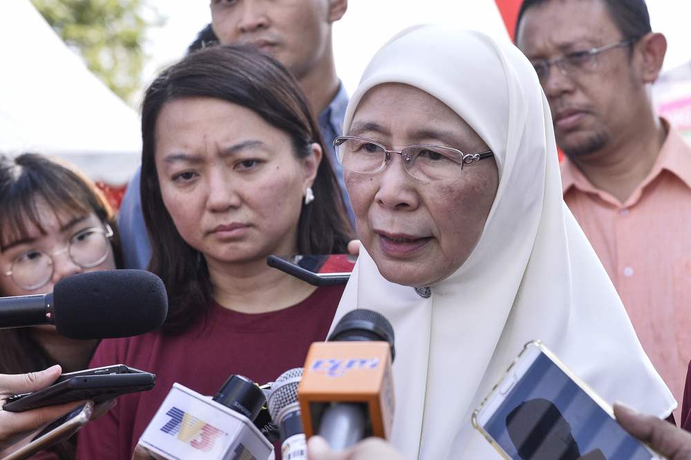 Datuk Seri Dr Wan Azizah Wan Ismail speaks to reporters after officiating the Family Day event in Putrajaya November 2, 2019. u00e2u20acu2022 Picture by Miera Zulyana