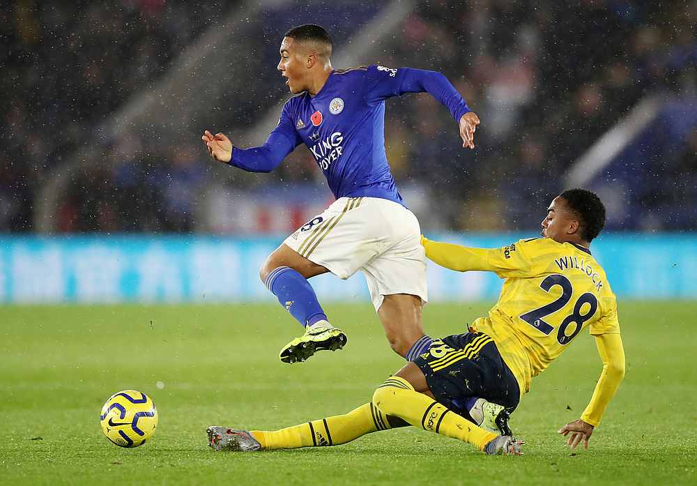 Leicester City's Youri Tielemans (front) in EPL action with Arsenal's Joe Willock at the King Power Stadium, Leicester November 9, 2019. u00e2u20acu201d Reuters pic