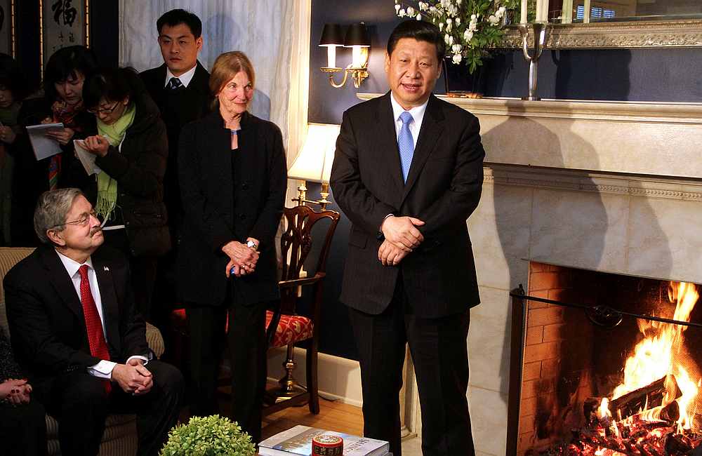China's Vice President Xi Jinping (right) talks with area residents in the home of Roger and Sarah Lande in Muscatine, Iowa February 15, 2012. Xi first visited the city in 1985. u00e2u20acu201d Reuters pic 