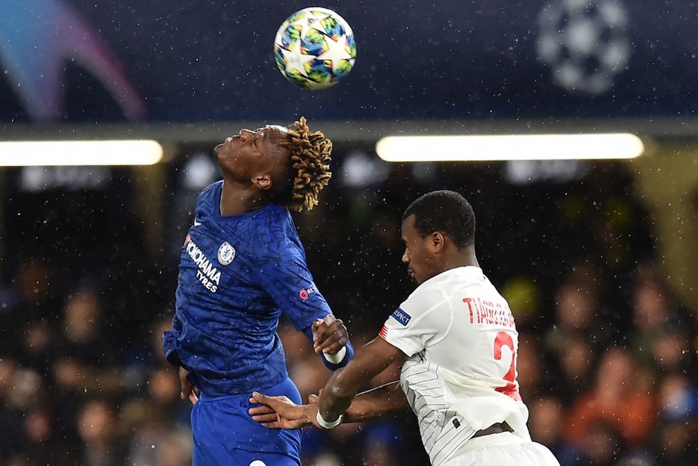 Chelsea’s Tammy Abraham vies with Lille’s Tiago Djalo during their Uefa Champion’s League Group H match at Stamford Bridge in London December 10, 2019. — AFP pic