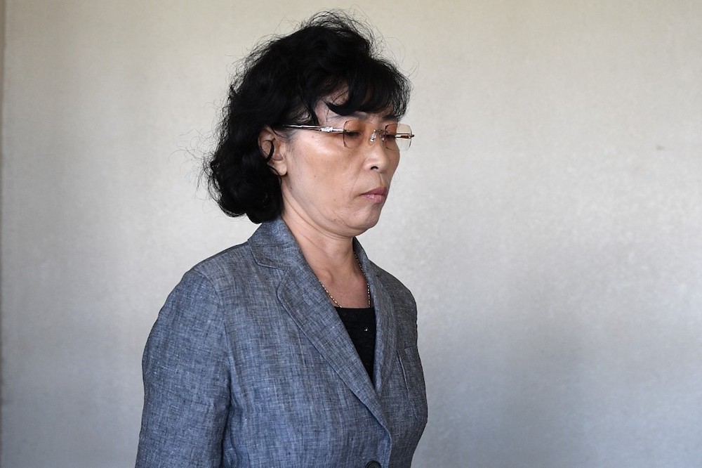 Kang Son-bi, wife of Mun Chol-myong, the North Korean man facing extradition from Malaysia to the US on money-laundering, leaves the Sessions Court in Kuala Lumpur December 13, 2019. u00e2u20acu201d AFP pic