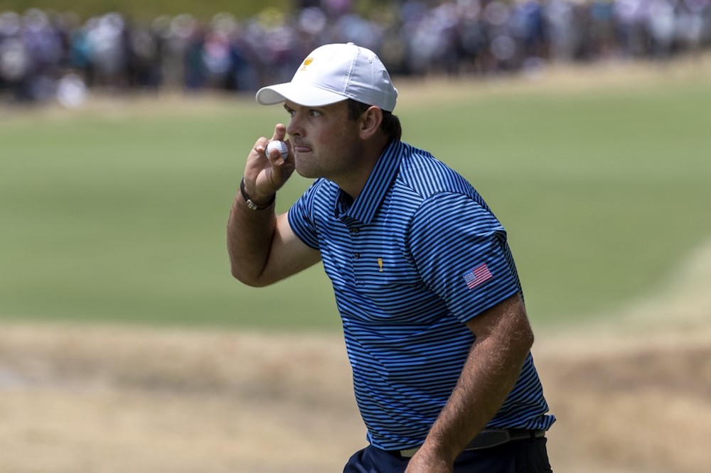 US team member Patrick Reed gestures to the crowd during day two of the Presidents Cup in Melbourne December 13, 2019. — AFP pic