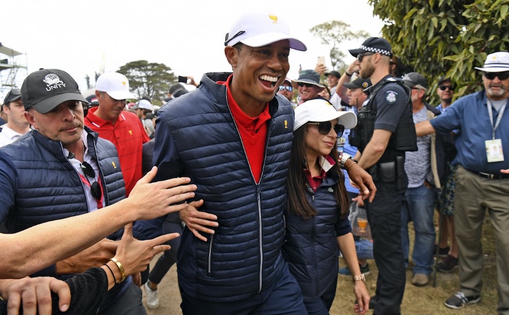 US team captain Tiger Woods celebrates with girlfriend Erica Herman after the US won the Presidents Cup golf tournament on the final day in Melbourne December 15, 2019. u00e2u20acu201d AFP pic